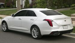 2023 Cadillac CT4 Luxury+ in Summit White, rear left.jpg
