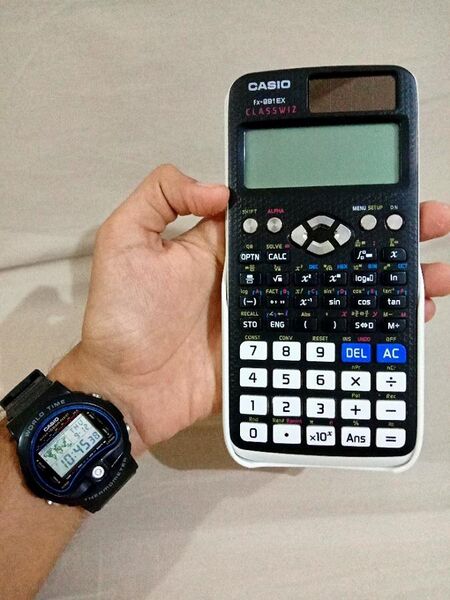 File:Watch and calculator.jpg