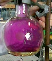 Round bottom flask filled with violet iodine vapour