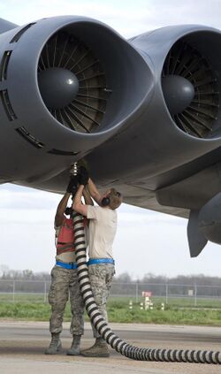Defense.gov News Photo 120306-F-KN424-910 - Airman 1st Class Kwann Peters left and Senior Airman Bryan Turner both with the 20th Aircraft Maintenance Unit disconnect an aircraft hose from a.jpg