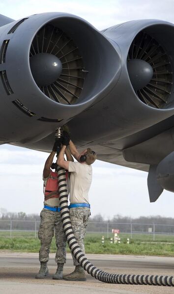 File:Defense.gov News Photo 120306-F-KN424-910 - Airman 1st Class Kwann Peters left and Senior Airman Bryan Turner both with the 20th Aircraft Maintenance Unit disconnect an aircraft hose from a.jpg