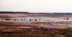 remnants of old pit mine being flooded