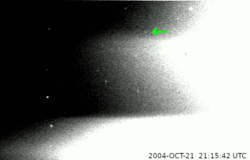 Cassini's discovery images of Polydeuces from 21 October 2004 show the moon as a faint, pixelated dot moving against the static background stars. The images are partially obscured by Saturn's bright glare emanating from the right.