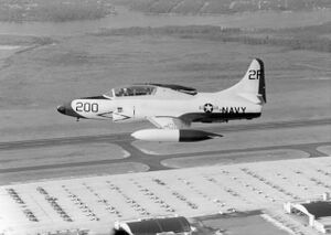 T-1A in flight over NAS Pensacola 1959.jpeg