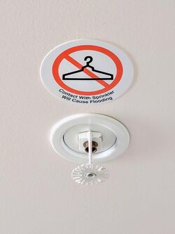 Contact with Sprinkler Will Cause Flooding Placard.jpg