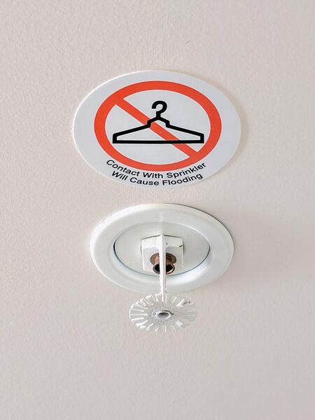 File:Contact with Sprinkler Will Cause Flooding Placard.jpg
