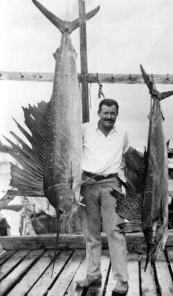 Portrait of author Ernest Hemingway posing with sailfish Key West, Florida.jpg