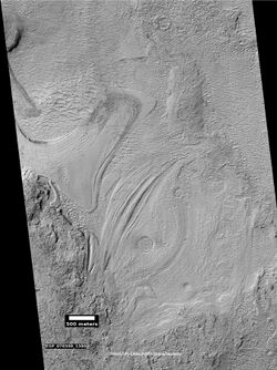 Banded terrain in Hellas Planitia, as seen by HiRISE under HiWish program.jpg