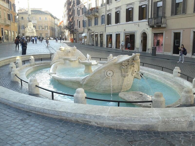 File:Fontana della Barcaccia restaurata, guardando verso Piazza Mignanelli.jpg
