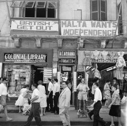 A view of shops with anti-British and pro-Independence signs, possibly on Kings Street, Valetta, Malta (5074435957).jpg