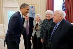 President Barack Obama greets 2010 Fermi Award recipients Dr. Mildred S. Dresselhaus and Dr. Burton Richter in the Oval Office, May 7, 2012