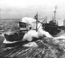 USS Chemung (AO-30) refueling USS Hooper (DE-1026) off Japan c1966.jpg