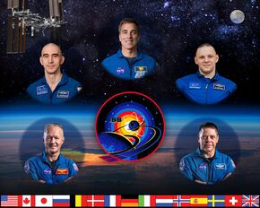 Expedition 63 and SpaceX Crew Dragon Demo 2 combined crew portrait.jpg