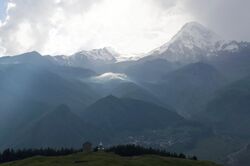 "Kazbegi", Panoramic view of Mount Kazbek (Mqinvartsveri) range, Caucasus, Georgia.jpg