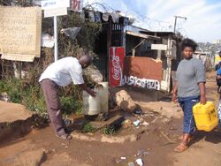 Communal tap (standpost) for drinking water in Soweto, Johannesburg, South Africa (2941729790).jpg
