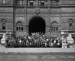 Universal Races Congress seated outside the entrance to the Imperial Institute, London, 1911.jpg