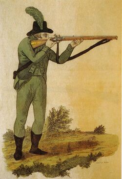 Green jacketed rifleman firing Baker rifle 1803.jpg