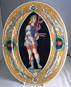 Minton tin-glaze Majolica oval plate decorated by Thomas Kirkby in Renaissance style after Mantegna original.jpg