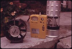 CLOSEUP OF MINE SAFETY DEVICES AS SHOWN AT A KENTUCKY STATE MINE SAFETY CONTEST HELD IN BENHAM, NEAR CUMBERLAND. FROM... - NARA - 556592.jpg