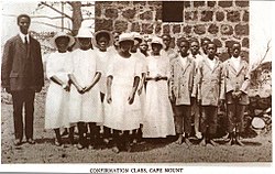 photo from 1918 of African children all dressed in white for confirmation at Cape Mount