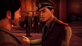 The player character is facing a police officer, who is berating him. Two officers stand in the background, near a police cruiser.