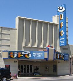 Exterior photograph of building with sign reading UFO Museum and Research Center
