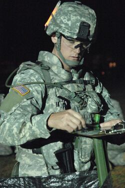 US Army 52149 Sgt. Joines on the night course.jpg
