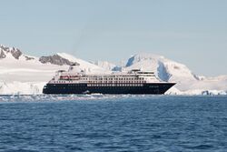 Photograph of a cruise ship off the Antarctic coast