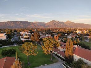 Aerial view of Walker Beach lawn, with the San Gabriel Mountains in the distance