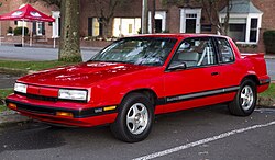 1991 Oldsmobile Cutlass Calais Quad 442 W41 Coupé in Bright Red, front left.jpg