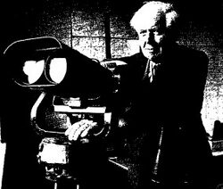 George Alcock with binoculars.jpg
