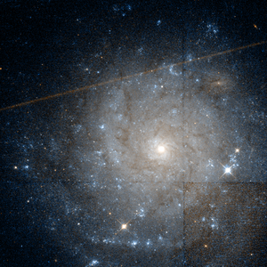 NGC 1058 - HST09042 n2-R814GB450.png