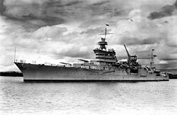 A large, gray warship at sea