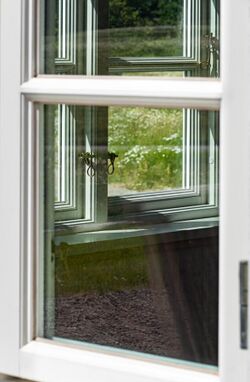 Window through a window in Röe gård café 1.jpg