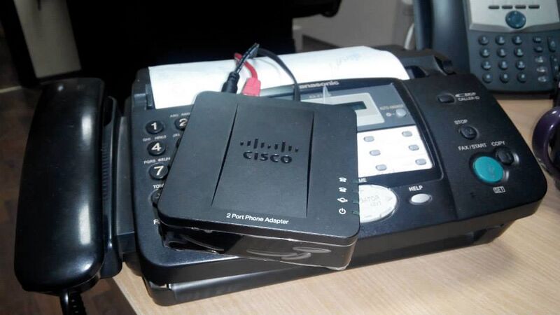 File:Cisco SPA112 and fax.jpg