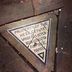 Detail of the triangle, which contains the text "Property of the Hess Estate which has never been dedicated for public purposes."