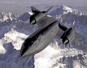 Dryden's SR-71B Blackbird, NASA 831, slices across the snow-covered southern Sierra Nevada Mountains of California after being refueled by a USAF tanker during a 1994 flight. The SR-71B was the trainer version of the SR-71. The dual cockpit allows the instructor to fly.