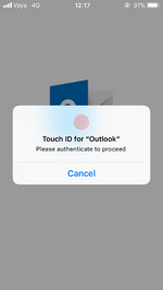 Screenshot of the loading screen of Microsoft Outlook on iOS 11, with the prompt for Touch ID unlock displayed