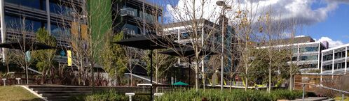 Group of buildings photographed from a large courtyard.