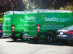 Pair of 2009 SolarCity Dodge Sprinters.JPG