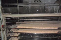 Particle board manufacturing process