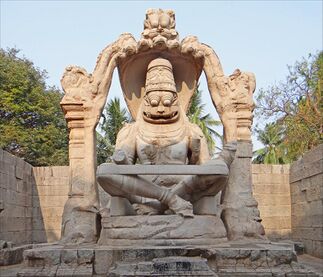 photo of Hampi temple sculpture showing ancient use of yoga strap