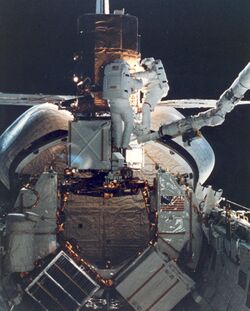 SMMS repair by STS-41C Astronauts.jpg