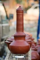 A Puttu kutti or puttu maker made of clay
