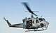 20160321020345!US Navy 120131-N-XK513-120 A Sailor directs a UH-1N Huey helicopter from (VMM) 261 (cropped).jpg