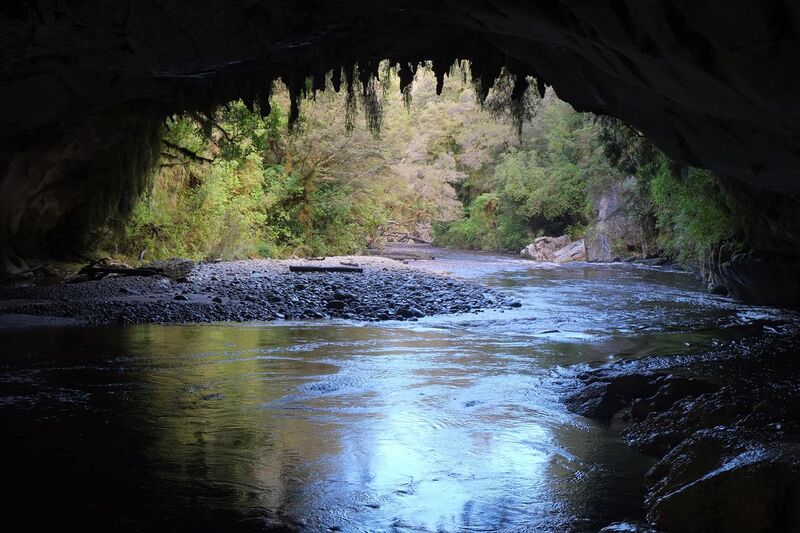File:Oparara River flowing out of Moria Gate arch.jpg