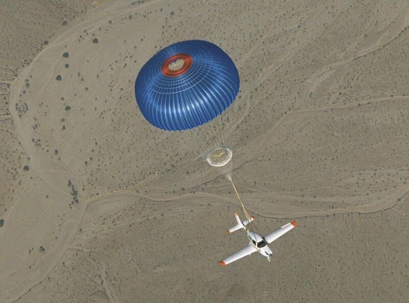 File:SR20 aircraft descends under parachute.jpg