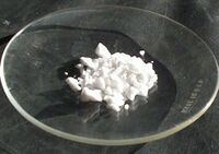Cadmium chloride hemipentahydrate