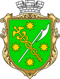 Vert bordure or, a caduceus or and an axe argent saltirewise, four octagrams or in chief, in base and in fess, and overall surmounted by a mural crown argent.