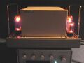 A photo of a Radford STA15 MK3 amplifier with glowing valves.